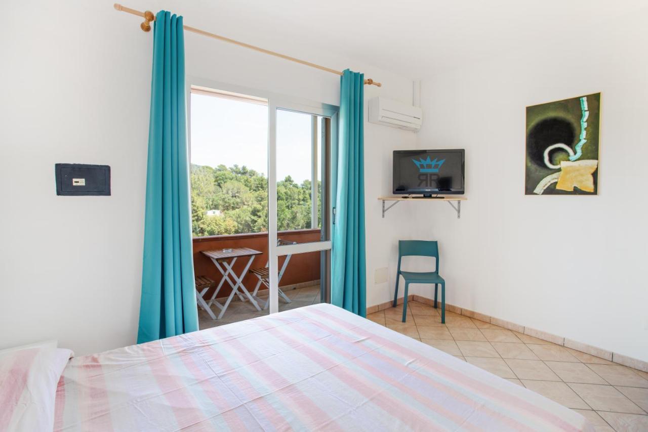 Residence Reale Porto Azzurro Esterno foto