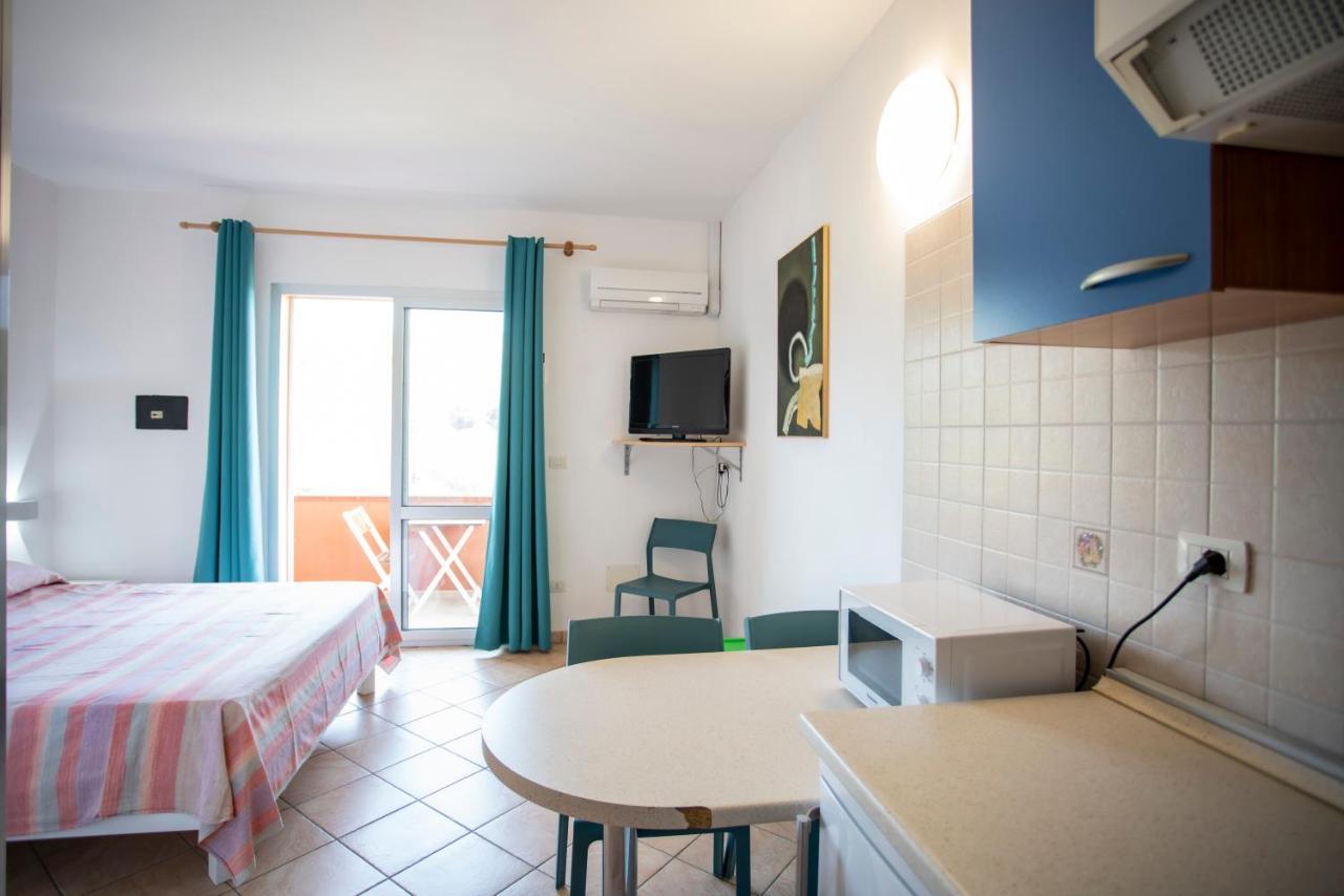 Residence Reale Porto Azzurro Esterno foto