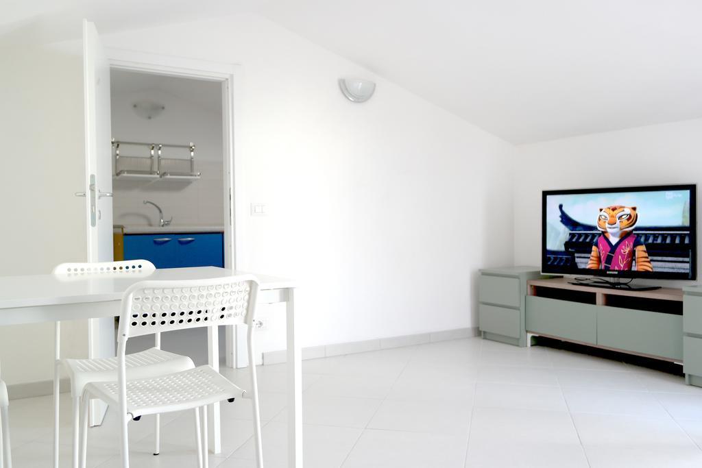 Residence Reale Porto Azzurro Esterno foto