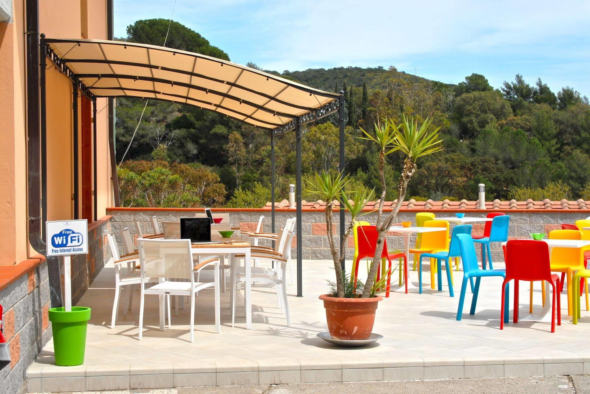 Residence Reale Porto Azzurro Esterno foto