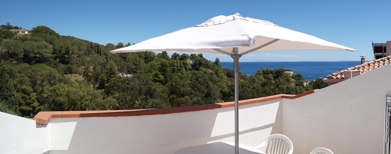 Residence Reale Porto Azzurro Esterno foto