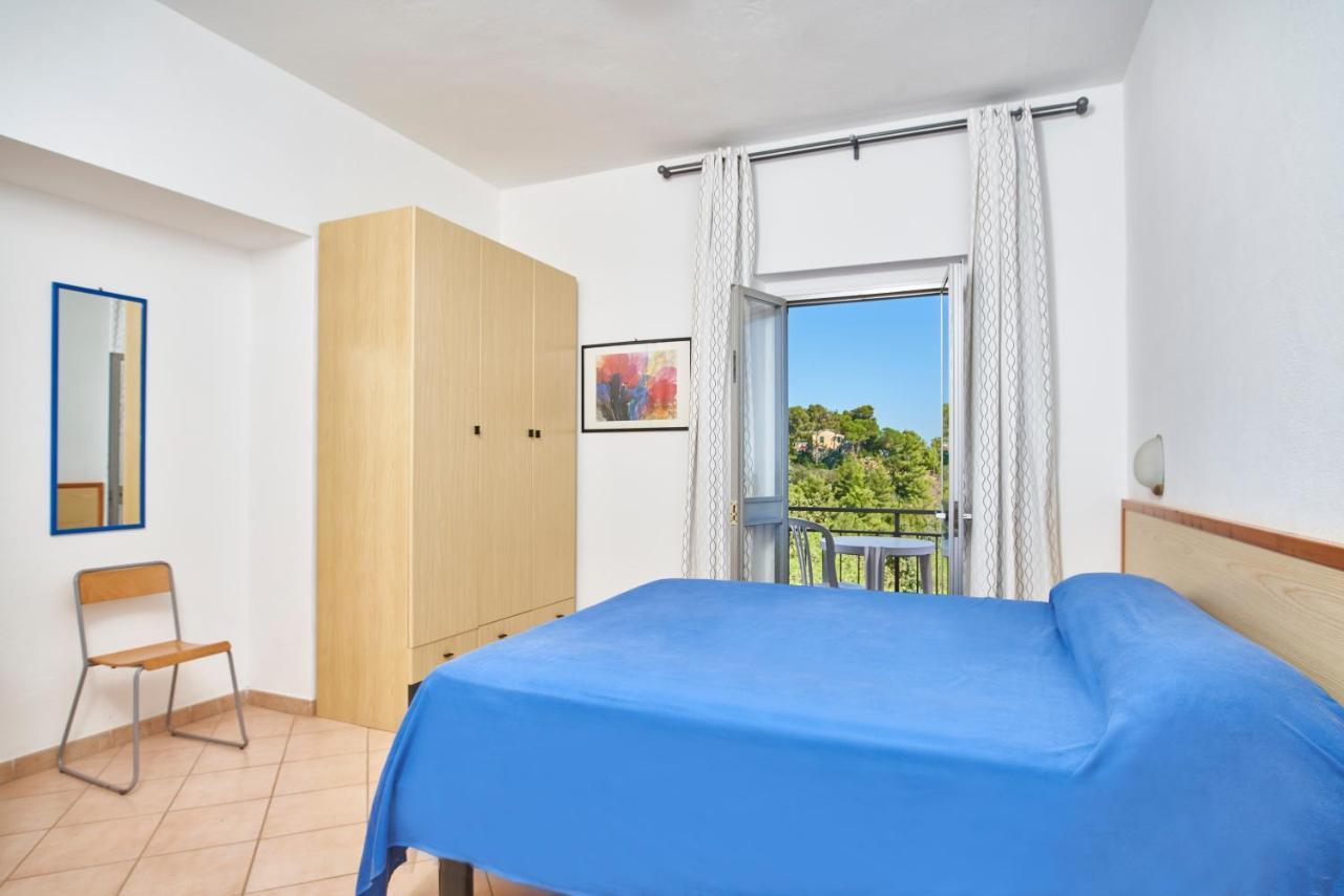 Residence Reale Porto Azzurro Esterno foto